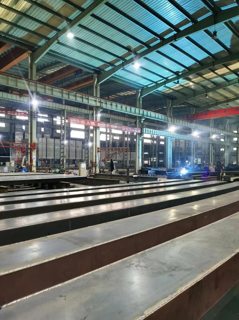 鋼結(jié)構(gòu)加工車間圖片(鋼結(jié)構(gòu)加工車間圖片共參考5篇,我?guī)湍阏伊艘恍╀摻Y(jié)構(gòu)加工車間的實(shí)景圖片)