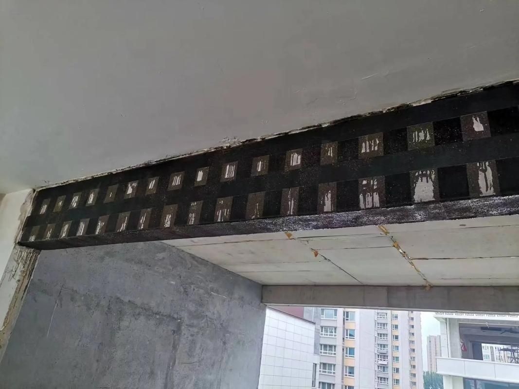 碳纖維加固混凝土圖片(碳纖維加固混凝土圖片共參考21篇資料,我?guī)湍阏伊艘恍┨祭w維加固混凝土的圖片)